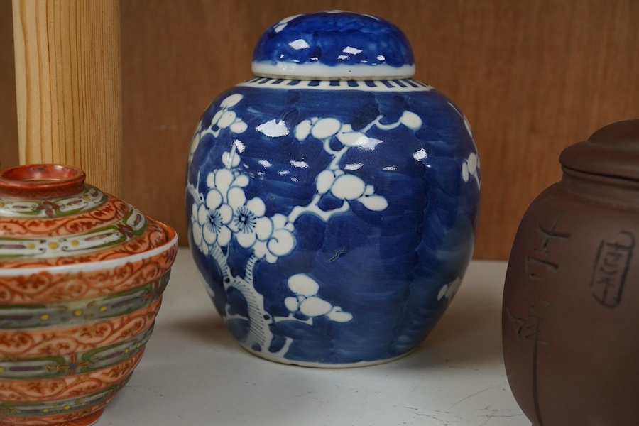 A Chinese Yixing teapot, a blue and white prunus jar, a Kutani tea bowl and two covers, other items, largest 15cm high